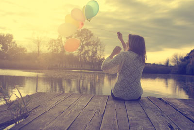 Relaxing-on-a-dock-with-balloons