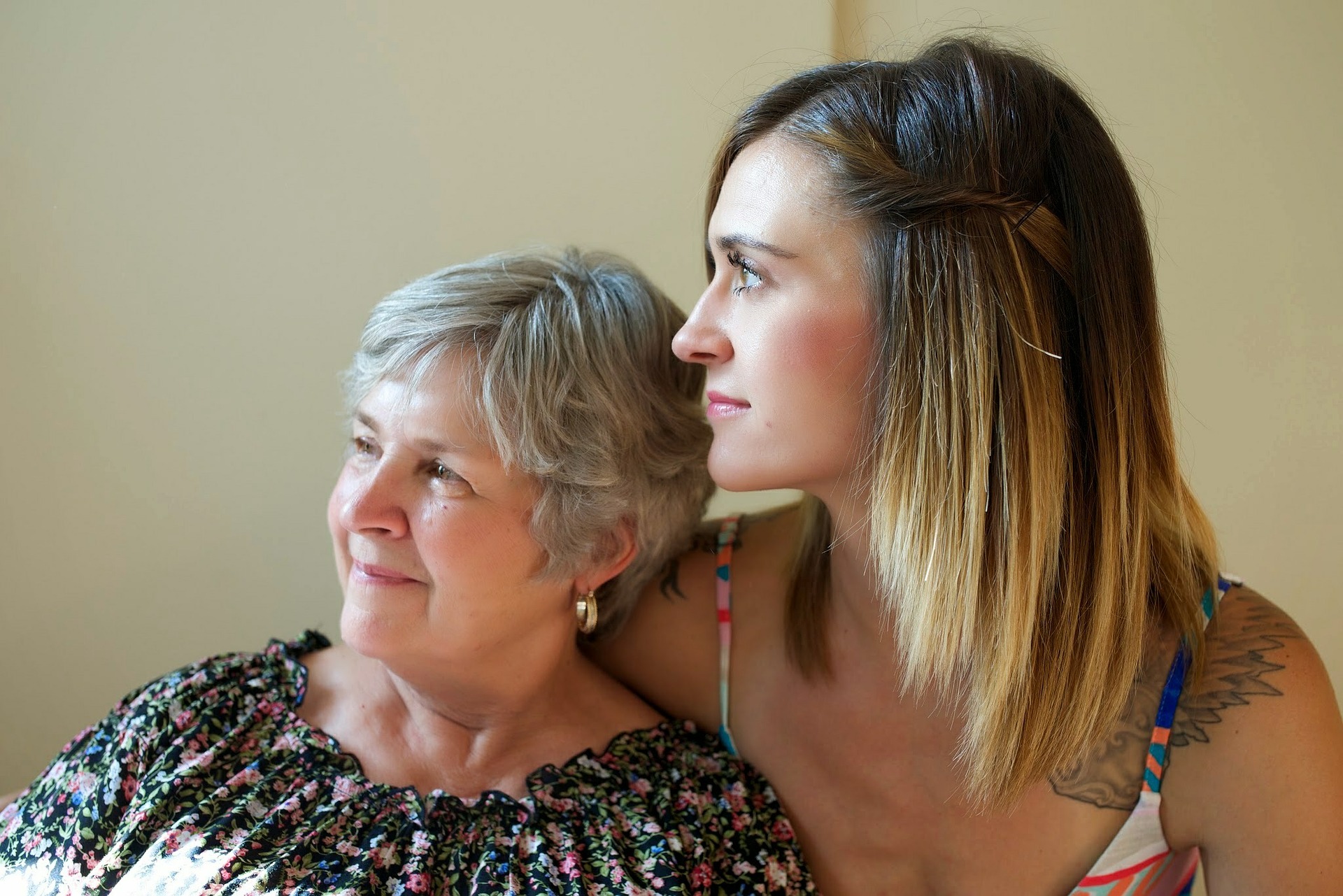 mother and daughter sitting together