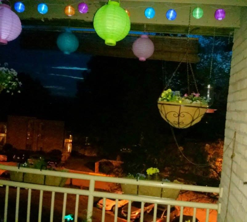 nightime balcony with lantern lights